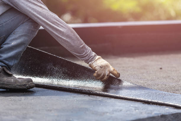 Professional Exterior Waterproofing technician working in Port Jefferson Station, NY